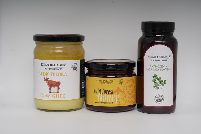 Three Kisan Bahadur products including a jar, a bottle, and a container on a white background